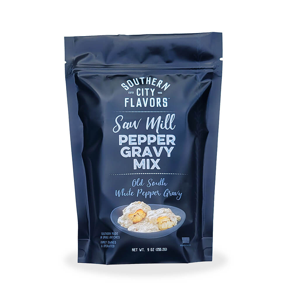 Blue package of Southern City Flavors Saw Mill Pepper Gravy Mix on a white background