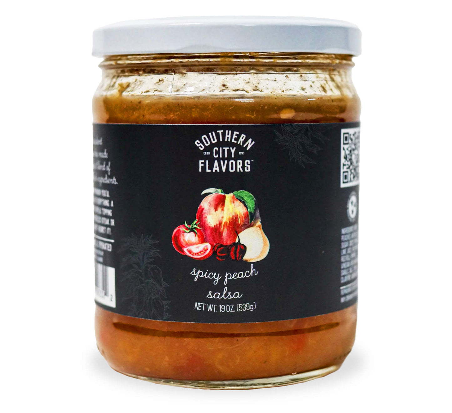 Jar of Southern City Flavors spicy peach salsa on a white background