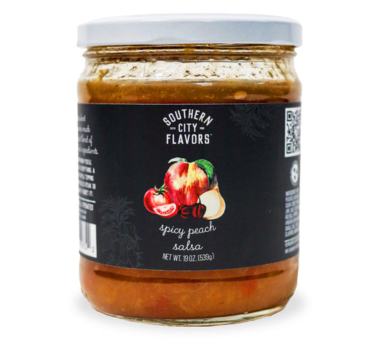 Jar of Southern City Flavors spicy peach salsa on a white background